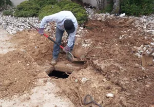 Inspection Reveals Custom Home Driveway Built Over Septic Tank